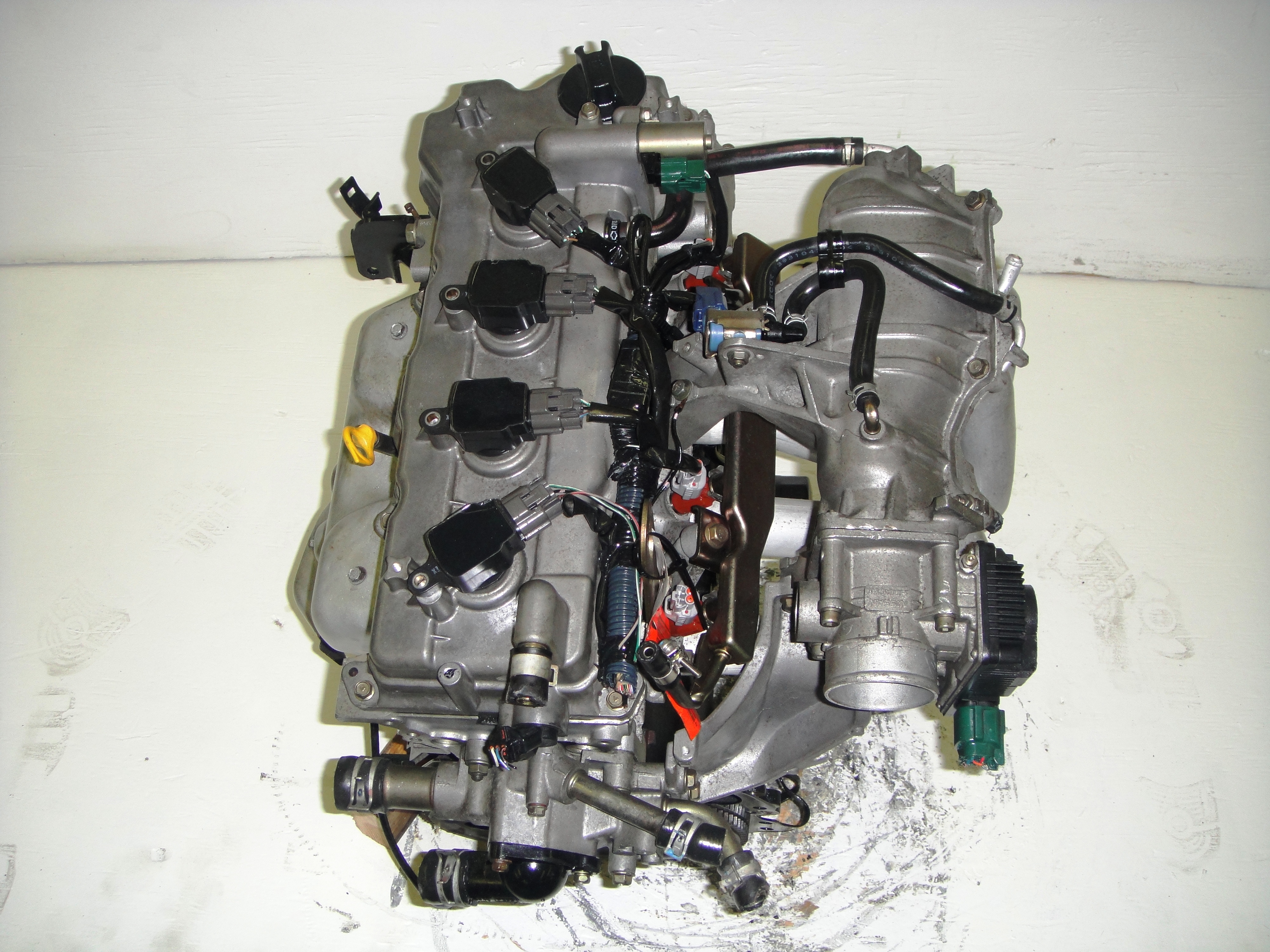 Двигатель дд. Двигатель Nissan qg18. Двигатель Ниссан qg18de. Nissan qg18de 1.8 л. Qg18de мотор 1.8.