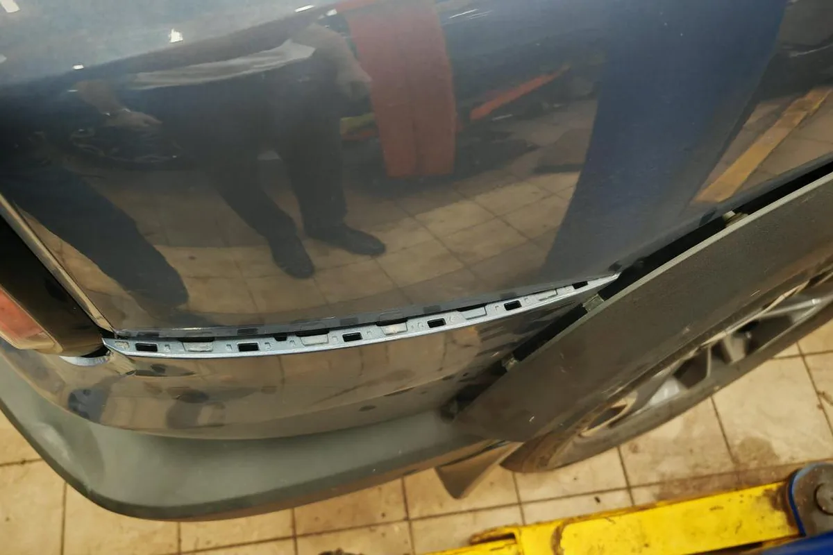 Повреждённый бампер Haval Dargo после ДТП