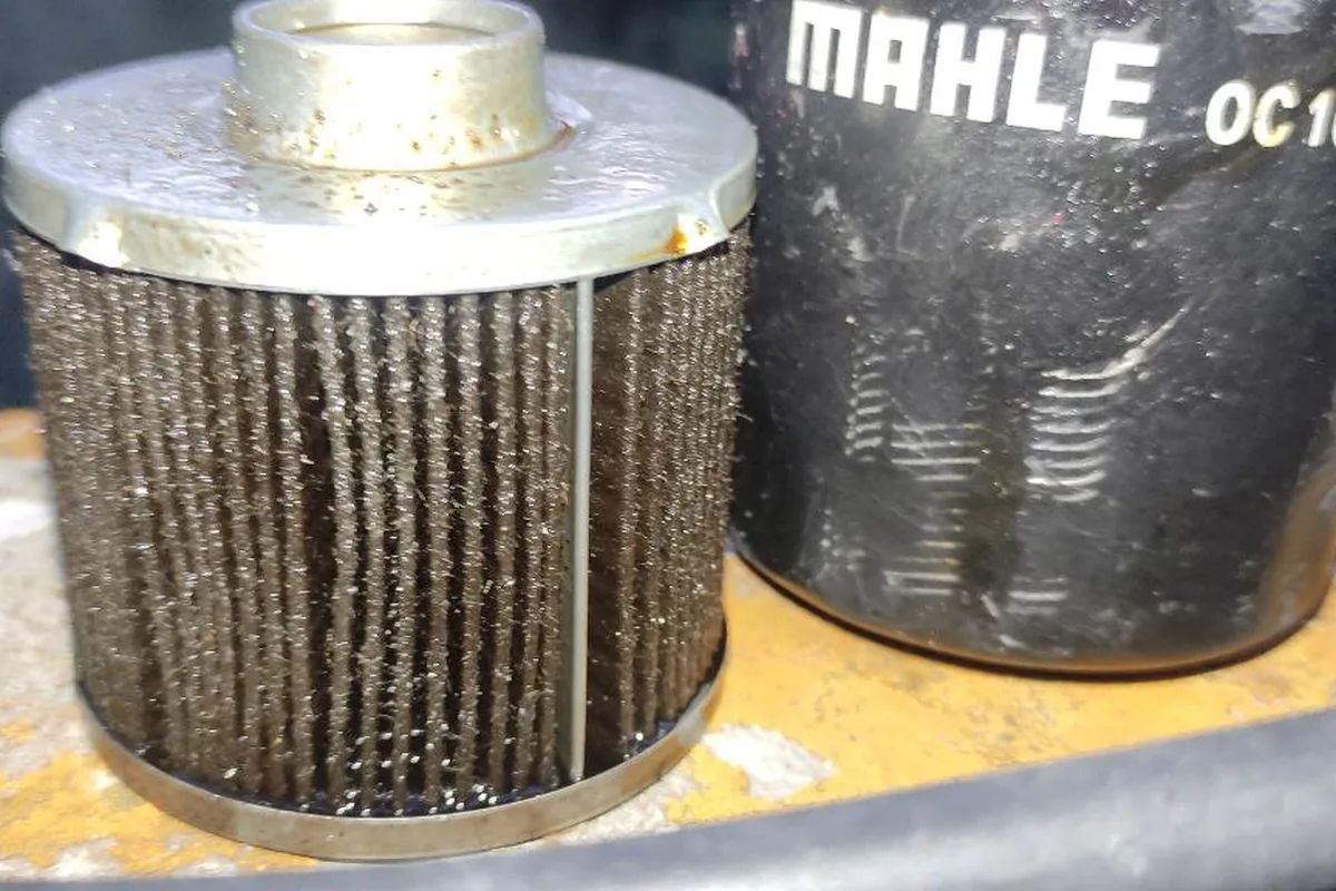 Вскрытые масляные фильтры и корпус MAHLE OC 1063