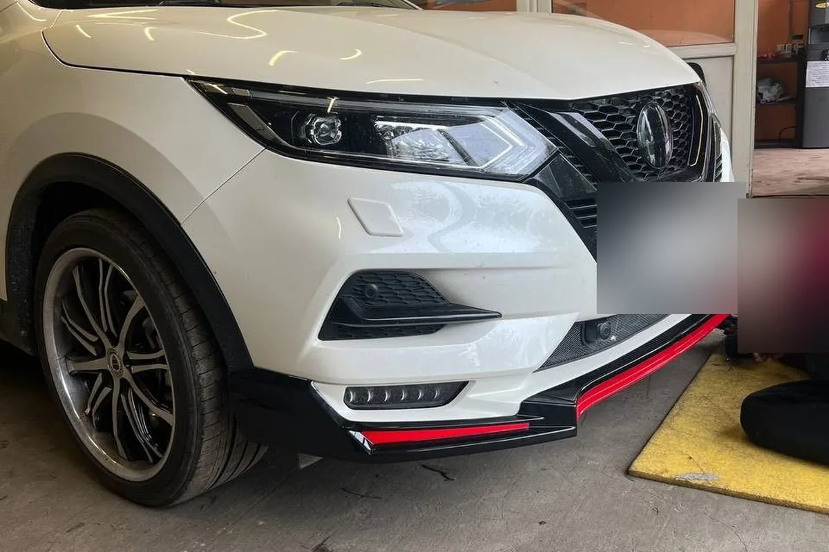 Nissan Qashqai J11 после рестайлинга с накладкой на передний бампер