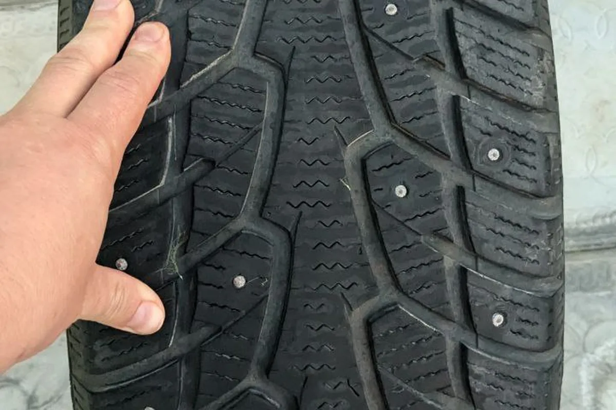 Шипованная зимняя шина 235/55 R18 с Chery Tiggo 8 после двух сезонов эксплуатации