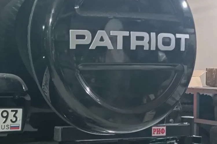 Жёсткий кожух запаски PATRIOT на калитке РИФ