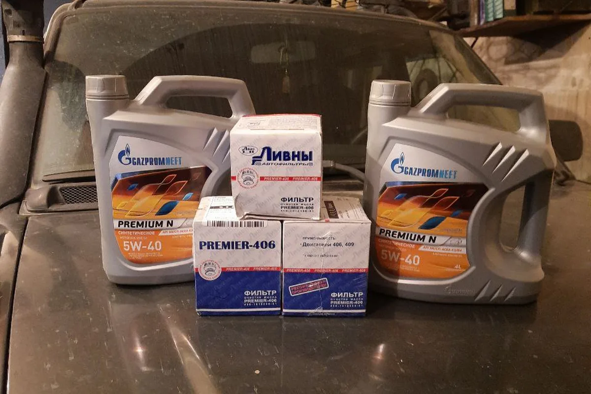 Синтетика 5W-40 и масляные фильтры на капоте УАЗ Патриот
