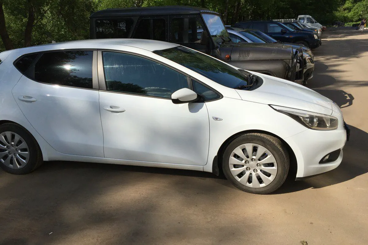 Белый Kia Ceed JD 2012 года из трейд-ина