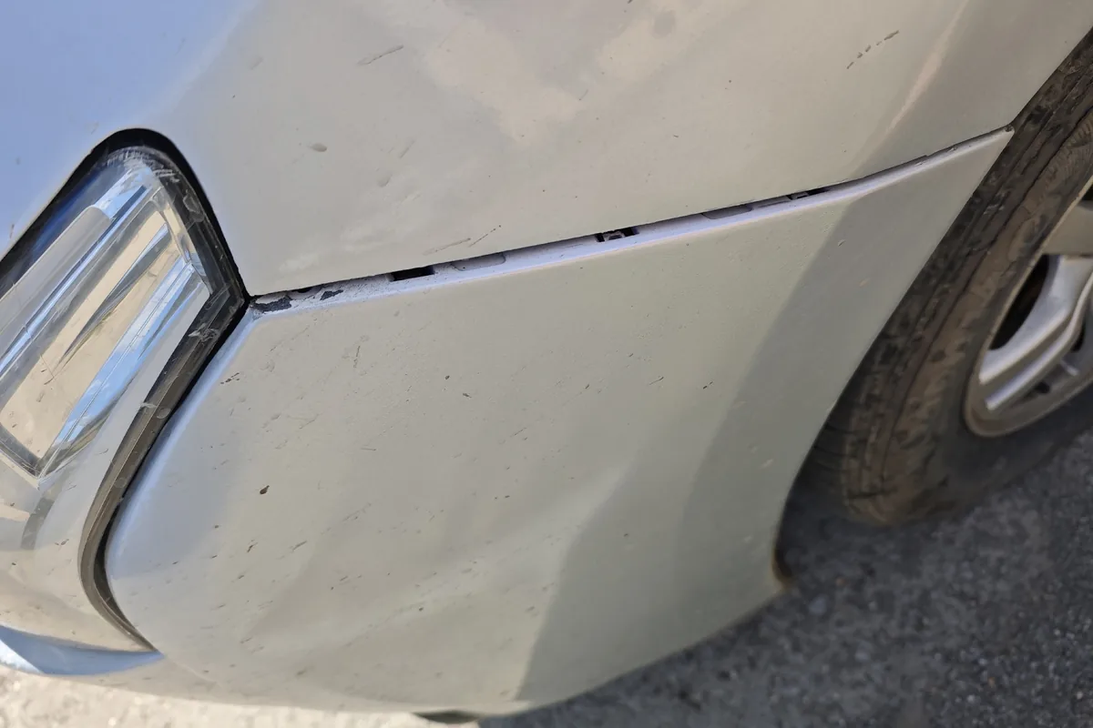 Щель между передним бампером и крылом Mitsubishi Outlander 3