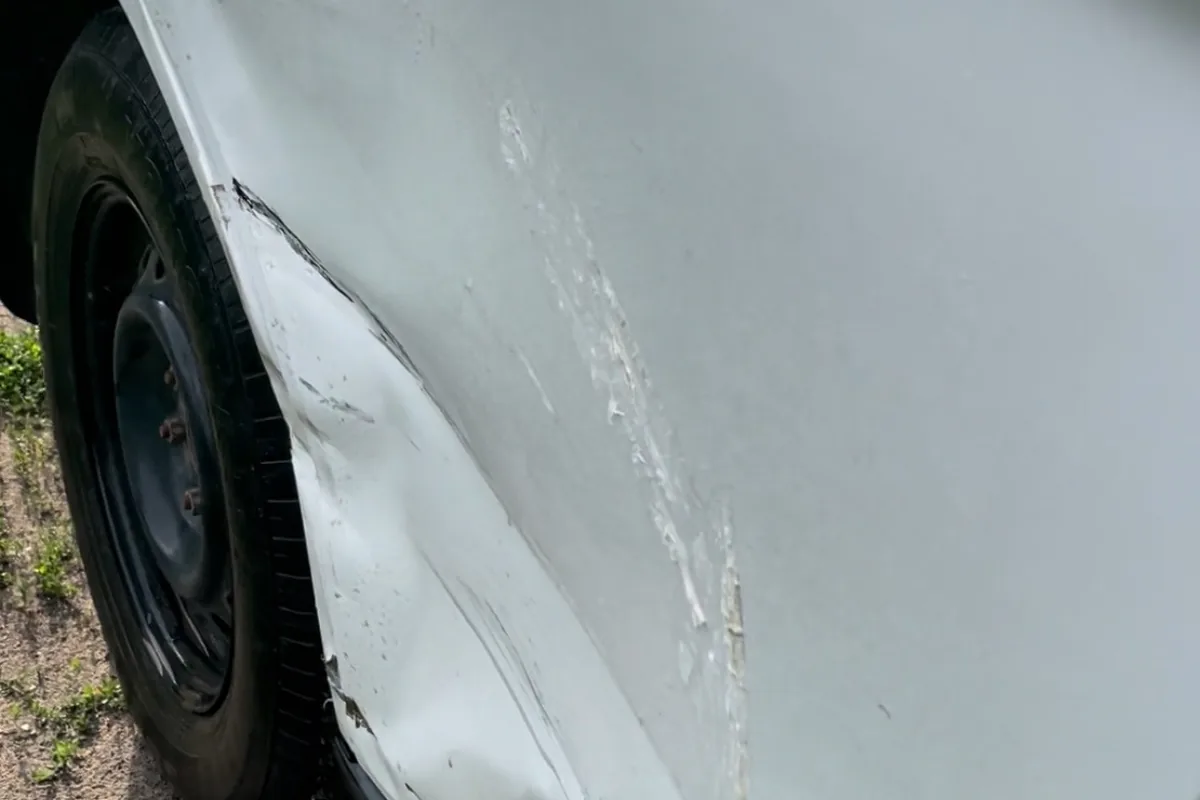 Вмятина на задней двери Mitsubishi Outlander 3