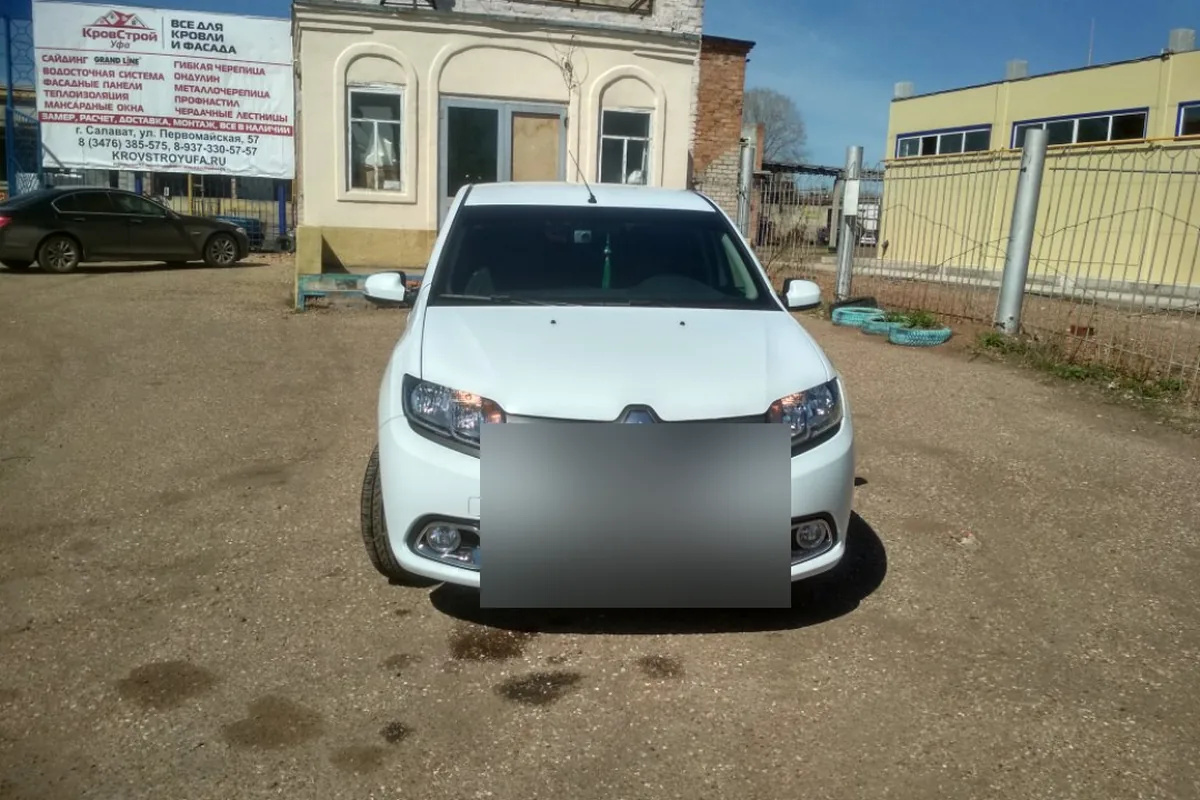 Белый Renault Logan 2 2016 года перед продажей